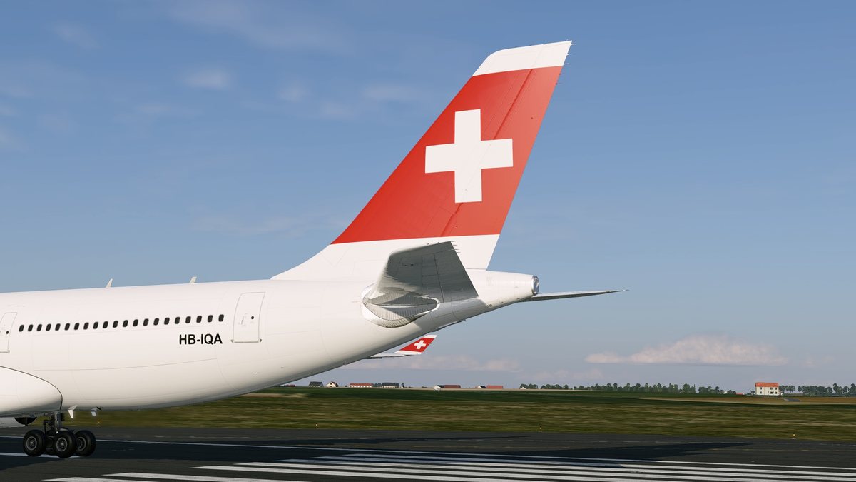 Tail of the A330-200 from the same camera position, with the taller and wider fin